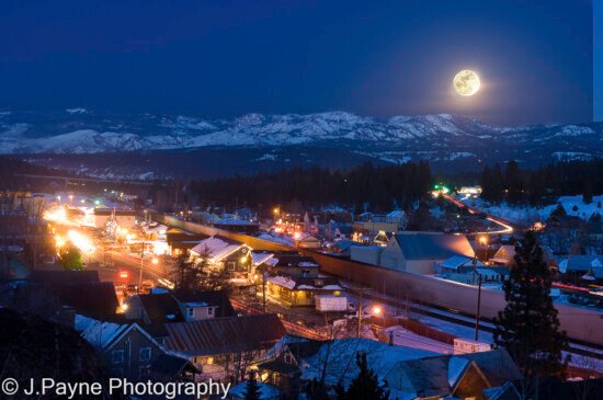 View over downtown Truckee with the winter moon rising over the Mt. Rose range. View over downtown Truckee with the winter moon rising over the Mt. Rose range.